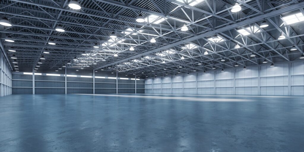 Image of empty warehouse with lighting and working electrics by Instant Electrical providing electrical maintenance in Christchurch, including Belfast, Cashmere, Hornby, Riccarton, Northwood, Shirley, Papanui and Wainoni